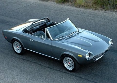  like the MGB released in 1962 four years before the Fiat Spider 